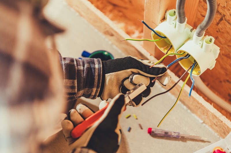 Electrician working with wiring